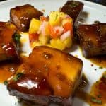 House smoked pork belly tossed in our Asian fusion glaze served with a pineapple salsa