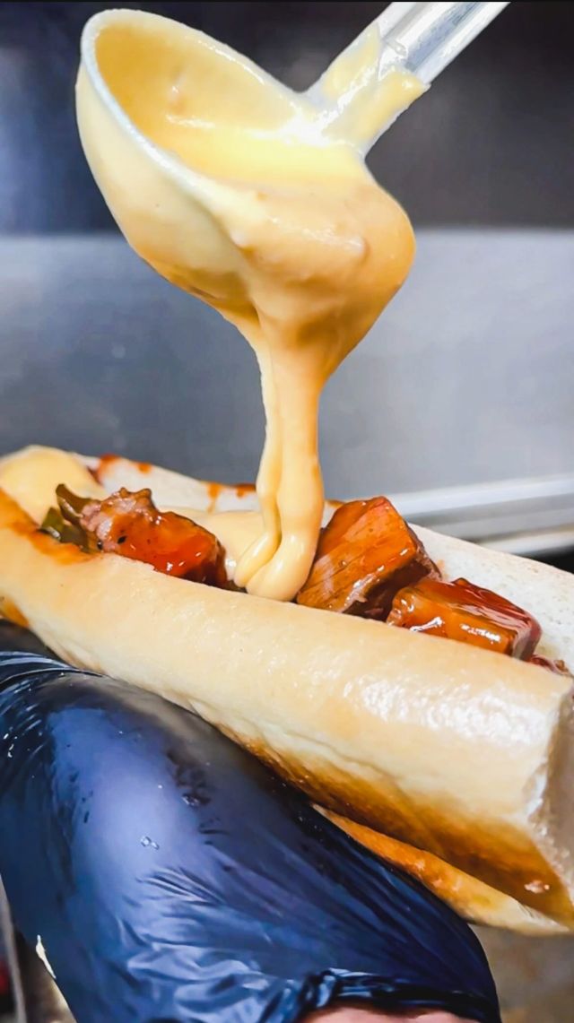 Indulge in the irresistible allure of our Smoked Burnt End Brisket Cheesesteak at Freddy J’s! 🥩🧀

Picture this: juicy, smoked brisket burnt ends, mingling with sautéed peppers and onions, all drenched in our rich bourbon BBQ sauce. But the real seduction begins when we pour our velvety @coopercheese American Cheese sauce over it, creating a cascade of cheesy goodness that’s downright hypnotic.

Nestled in a toasted long roll, each bite is a perfect blend of smoky, savory, and cheesy ecstasy. It’s not just a cheesesteak; it’s a culinary romance waiting to happen.

Surrender to the seduction of cheese and smoke with our Smoked Burnt End Brisket Cheesesteak. The experience is waiting for you at Freddy J’s! 🍴🔥🧀