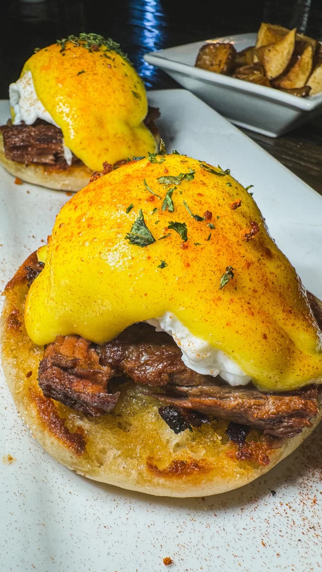 Sunday brunch isn’t complete without Freddy J’s signature Short Rib Benedict! Our tender, Guinness-braised short ribs sit atop toasted English muffins, joined by two poached eggs and draped in rich hollandaise sauce. With a side of golden breakfast potatoes, it’s a symphony of flavors that defines Sunday indulgence. Available from 11am to 2pm—don’t miss out on making your weekend brunch a memorable one!