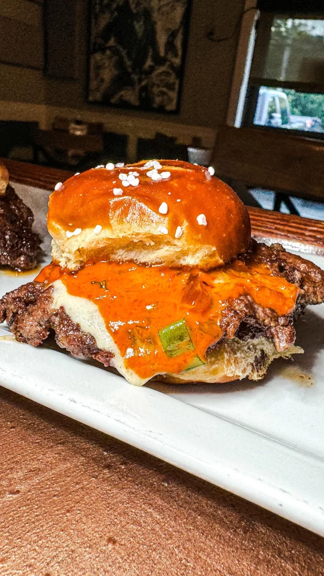 We dare you to try and eat only one slider for Happy Hour. The pretzel bun, @coopercheese, and kimchi aioli combo is 🐐ed.
